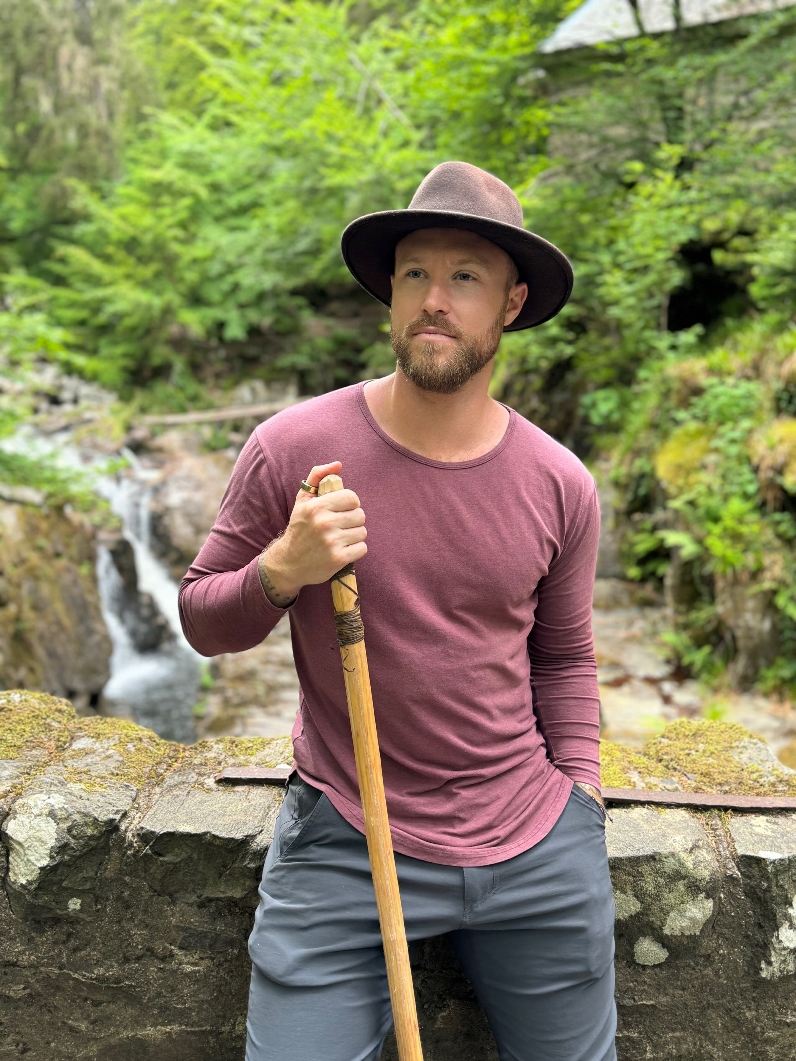 Brandon outdoors with walking stick