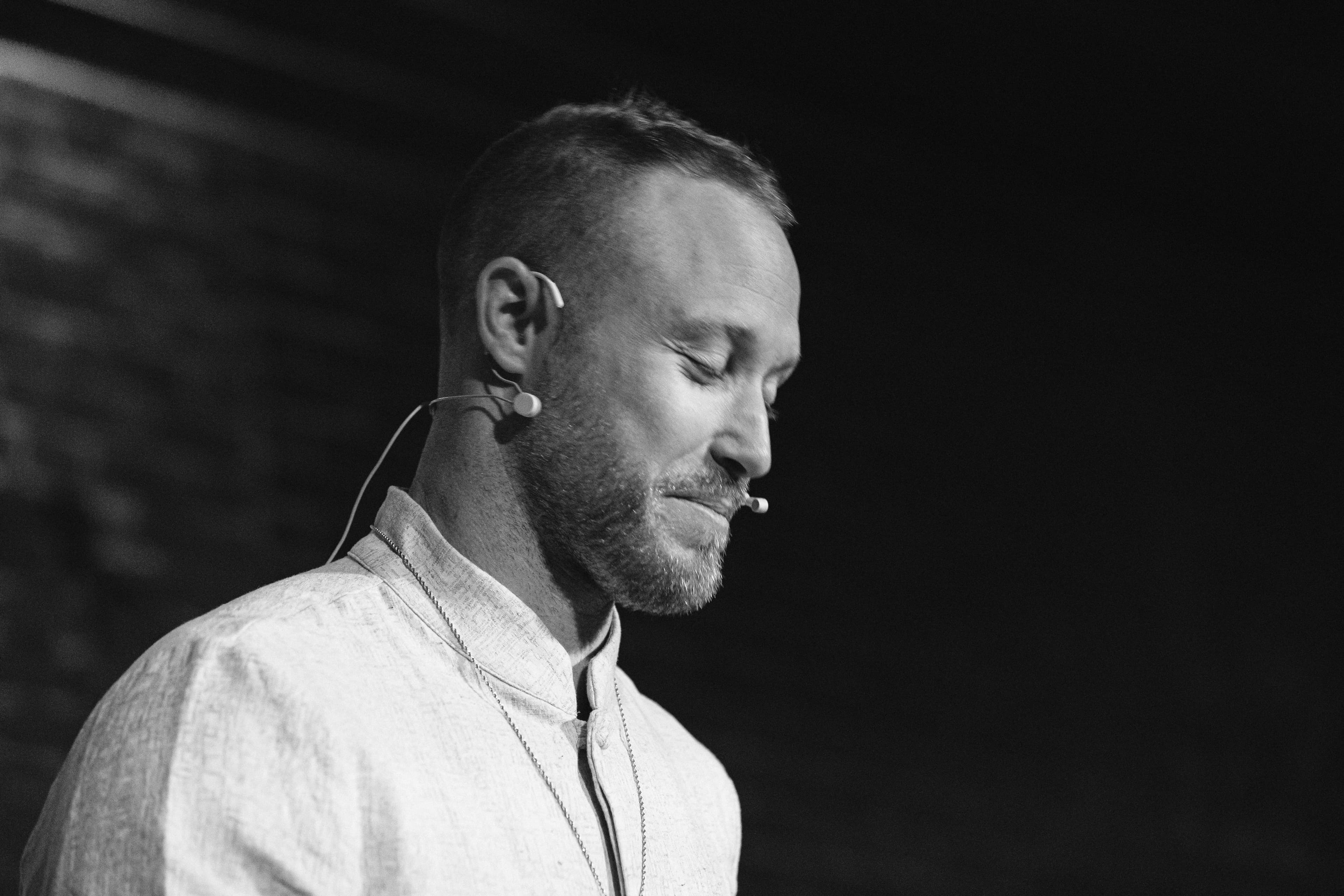 Brandon facilitating on stage